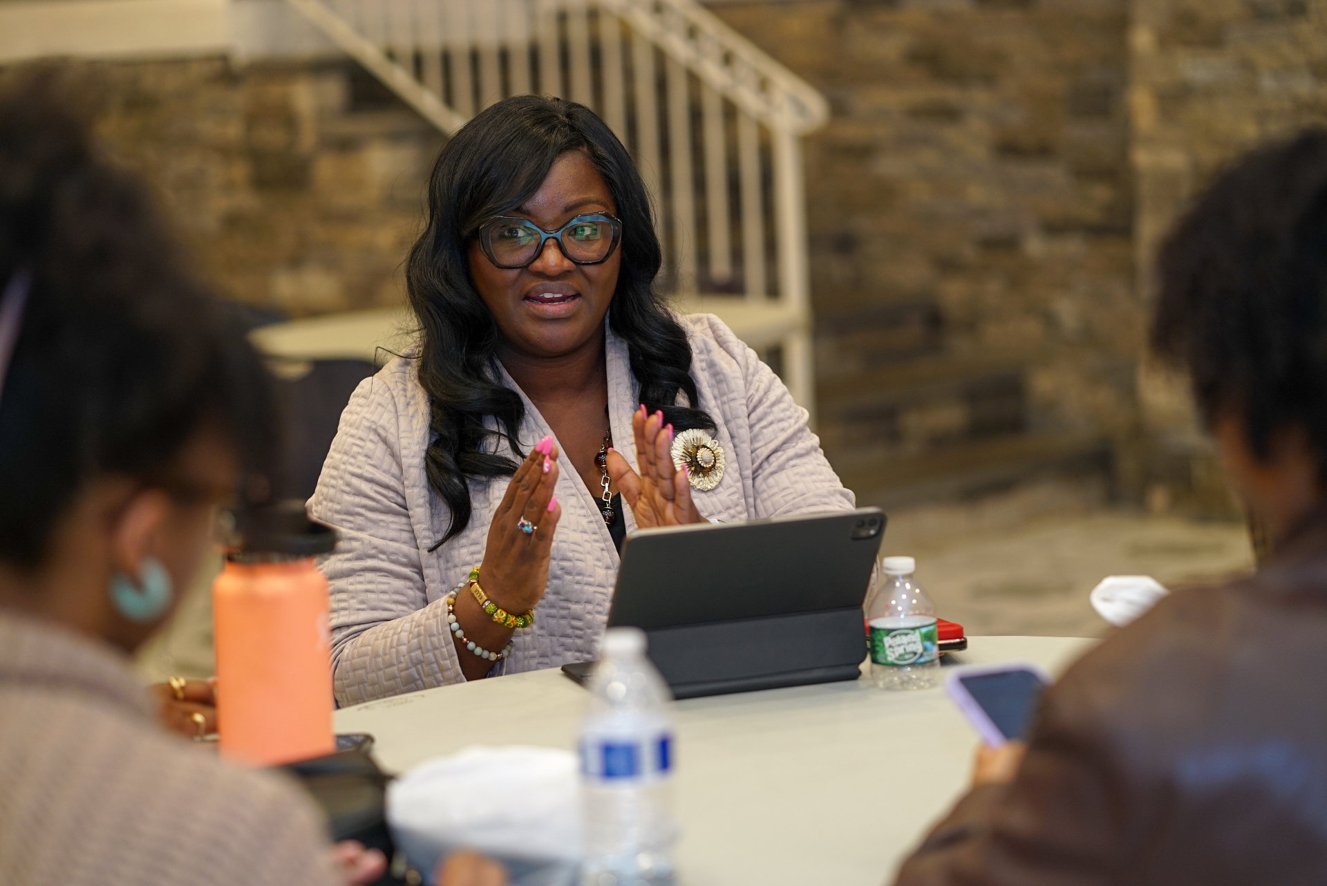 Elle leading a roundtable discussion