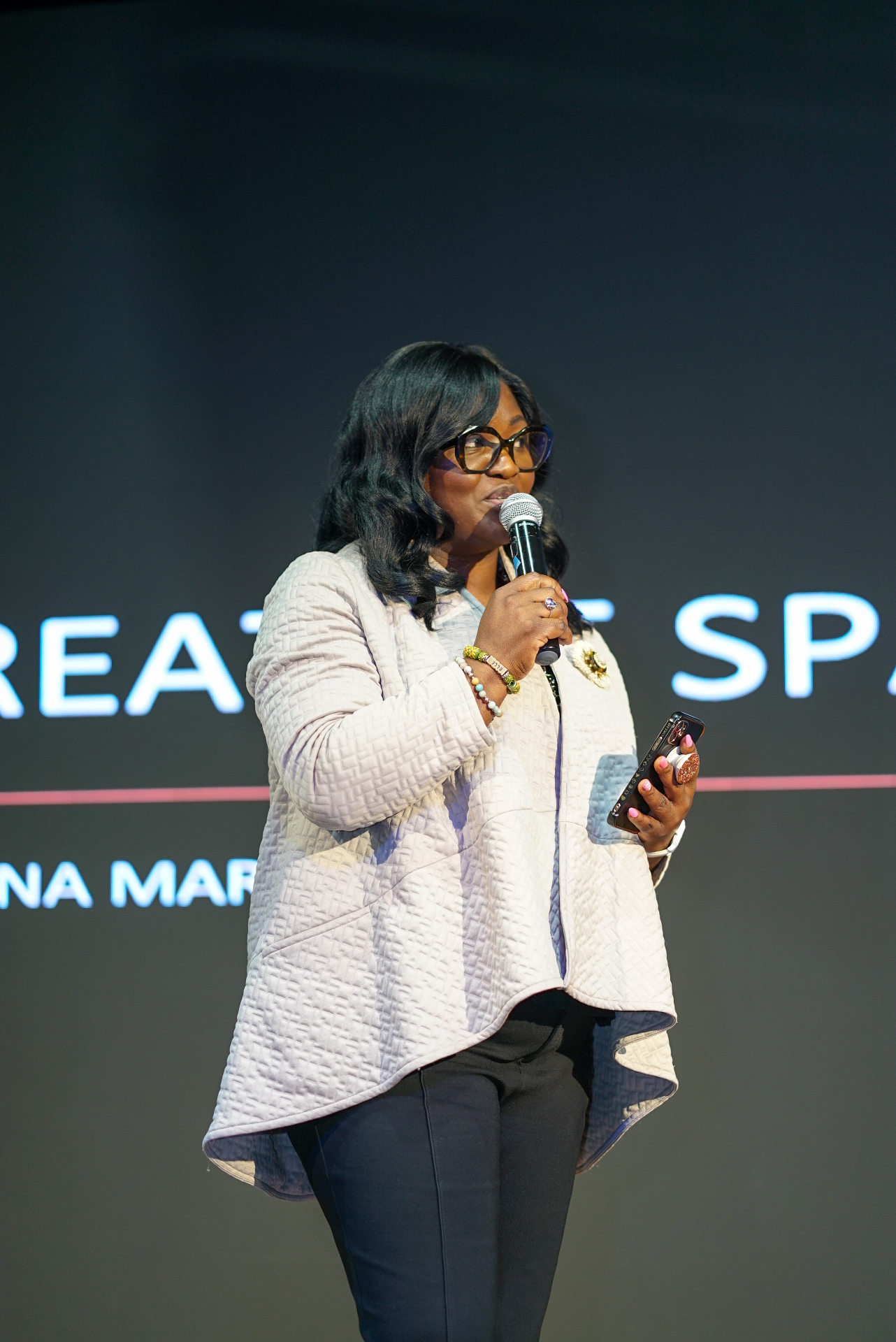 Elle delivering keynote at Thrive Career Summit